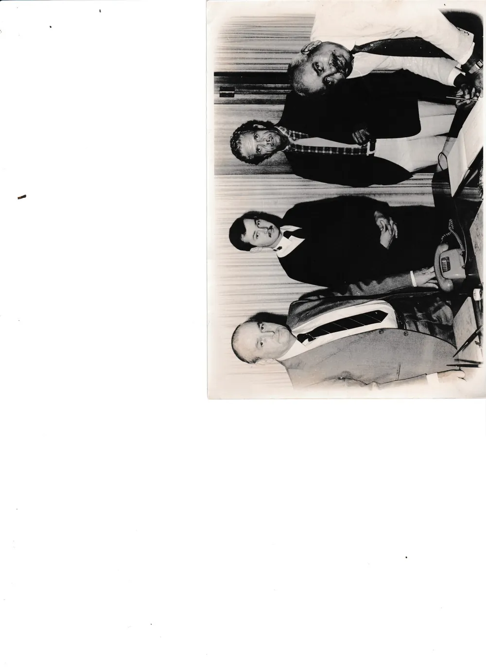 A group of men in suits.