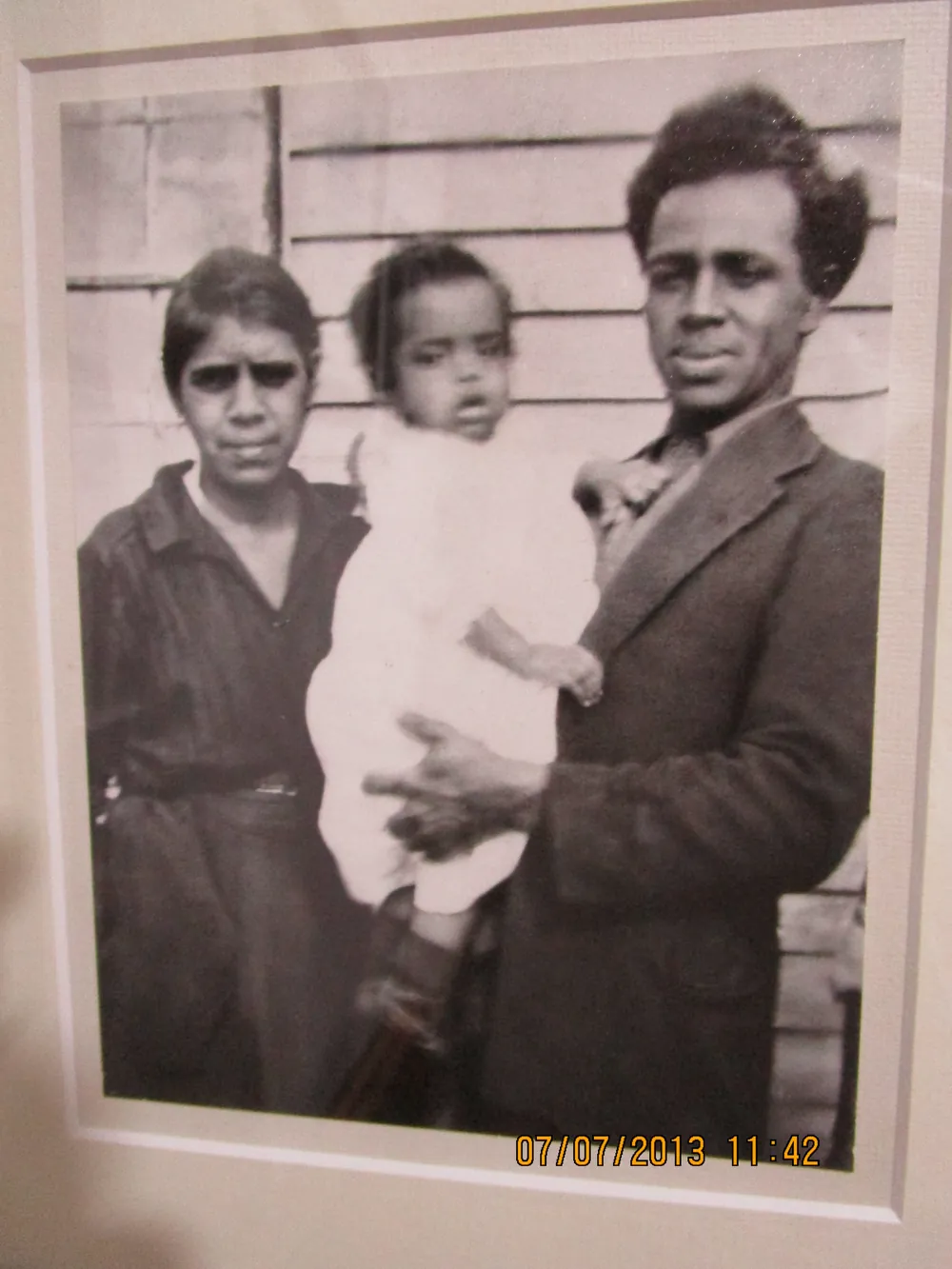 A framed family portrait.