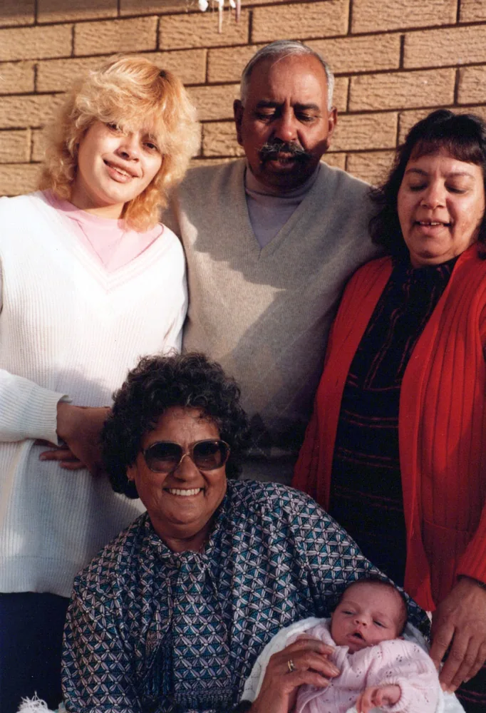 A family group with a baby.