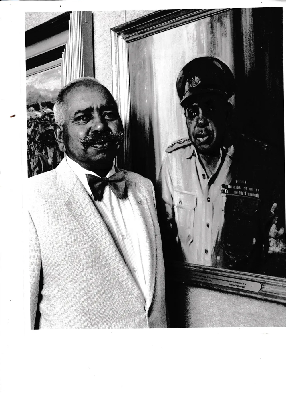 Two men, one in uniform.