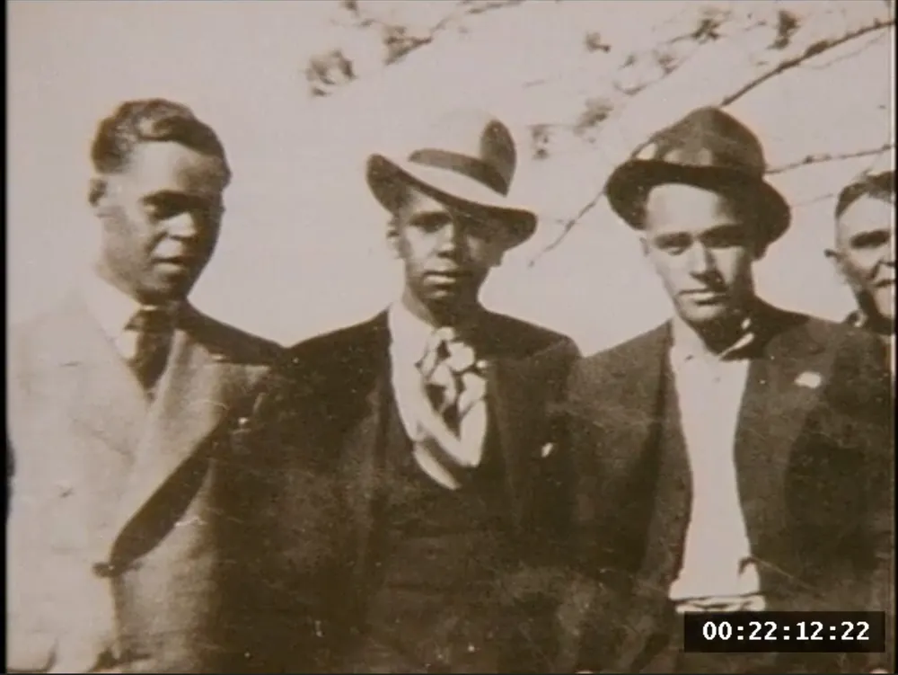 Four men in hats.