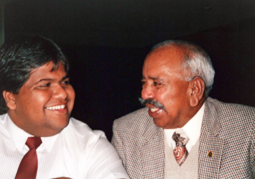 Two men in conversation.